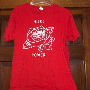 Red t-shirt with white lettering.